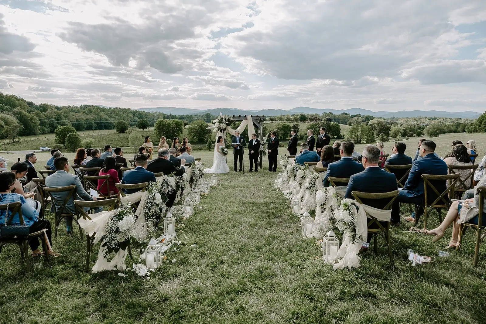 Denissa and Conner's hilltop ceremony in Rochelle, Virginia, with the Blue Ridge behind